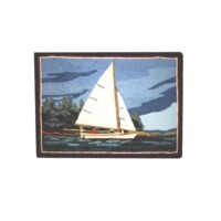 A tapestry depicting a sailboat on the water with a landscape in the background.