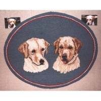 Circular rug featuring a needlepoint depiction of a labrador retriever, flanked by two smaller framed images of the same dog.