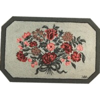 Floral patterned rug with an octagonal border.
