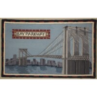 Handmade rug depicting the brooklyn bridge with a "bay parkway" street sign.
