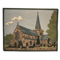 Embroidered depiction of a stone church with a spire, surrounded by trees and clouds overhead.