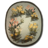 Oval-shaped floral needlepoint rug with various colorful flowers on a grey background.