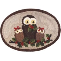 Embroidered patch featuring a family of cartoon owls with holly decorations.