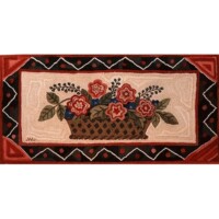 Handcrafted rug featuring a floral basket design with a red and black border.