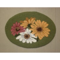 Oval-shaped latch hook rug featuring a design of colorful daisy flowers.