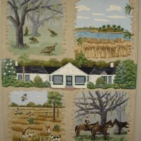 Embroidered tapestry depicting rural scenes with wildlife and a farmhouse across different seasons.
