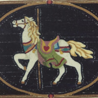 A mosaic depicting a white horse with a decorative saddle and blonde mane, encircled by a border.