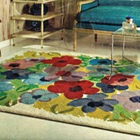 A colorful floral rug in a vintage living room setting.