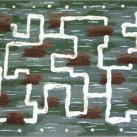 A rug featuring a geometric maze-like pattern in shades of green, brown, and white.