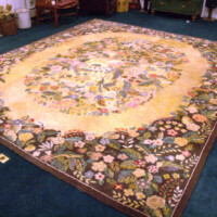 Ornate floral rug on a living room floor.